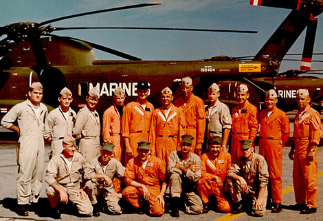 Marine Corps flight crews in front of a CH-53