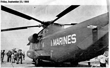 A CH-53A is parked on the flightline