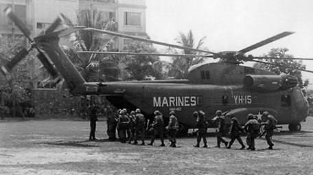Marine grunts load aboard a new CH-53