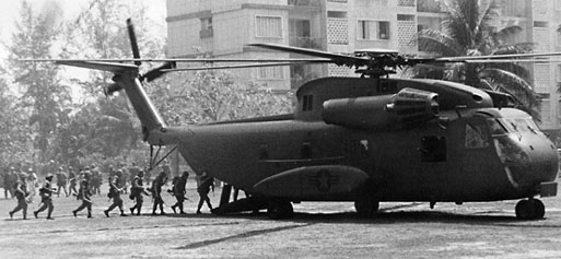 Marine grunts load aboard a new CH-53