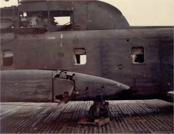 Rocket damage in the HMH-463 boneyard at MMAF