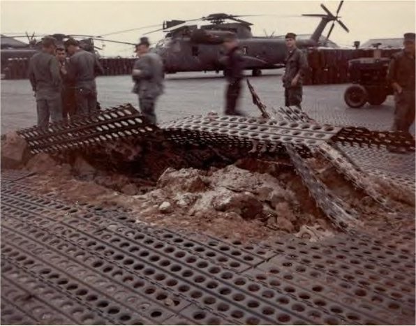 Rocket damage on HMH-463 flight line at MMAF