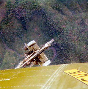 An HMH-463 aircraft slings a "dime-nickel"