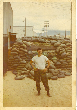 Larry South out behind the hydraulic shop in 1970.